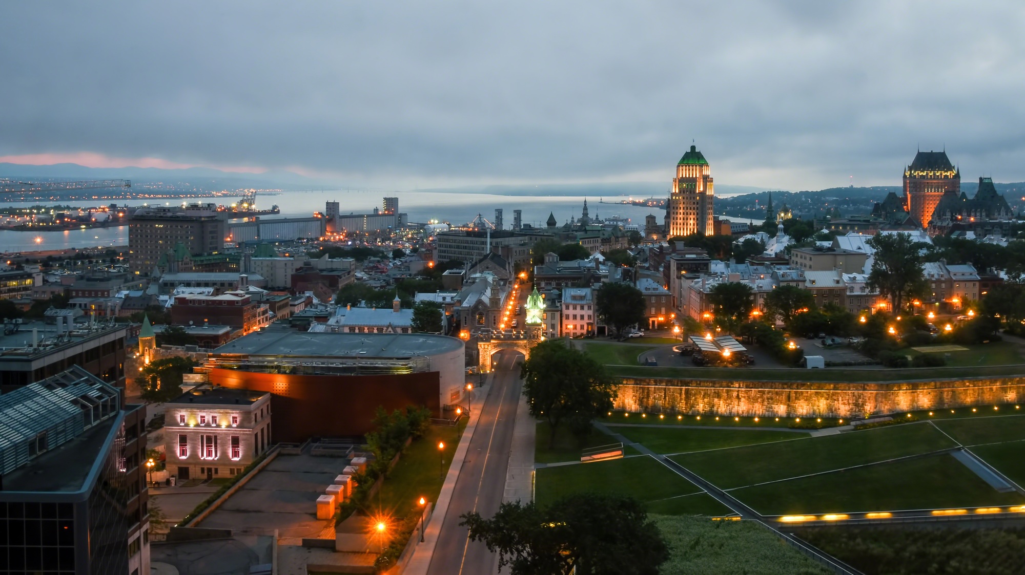 Early morning view of city lights in Quebec City as sun is rising